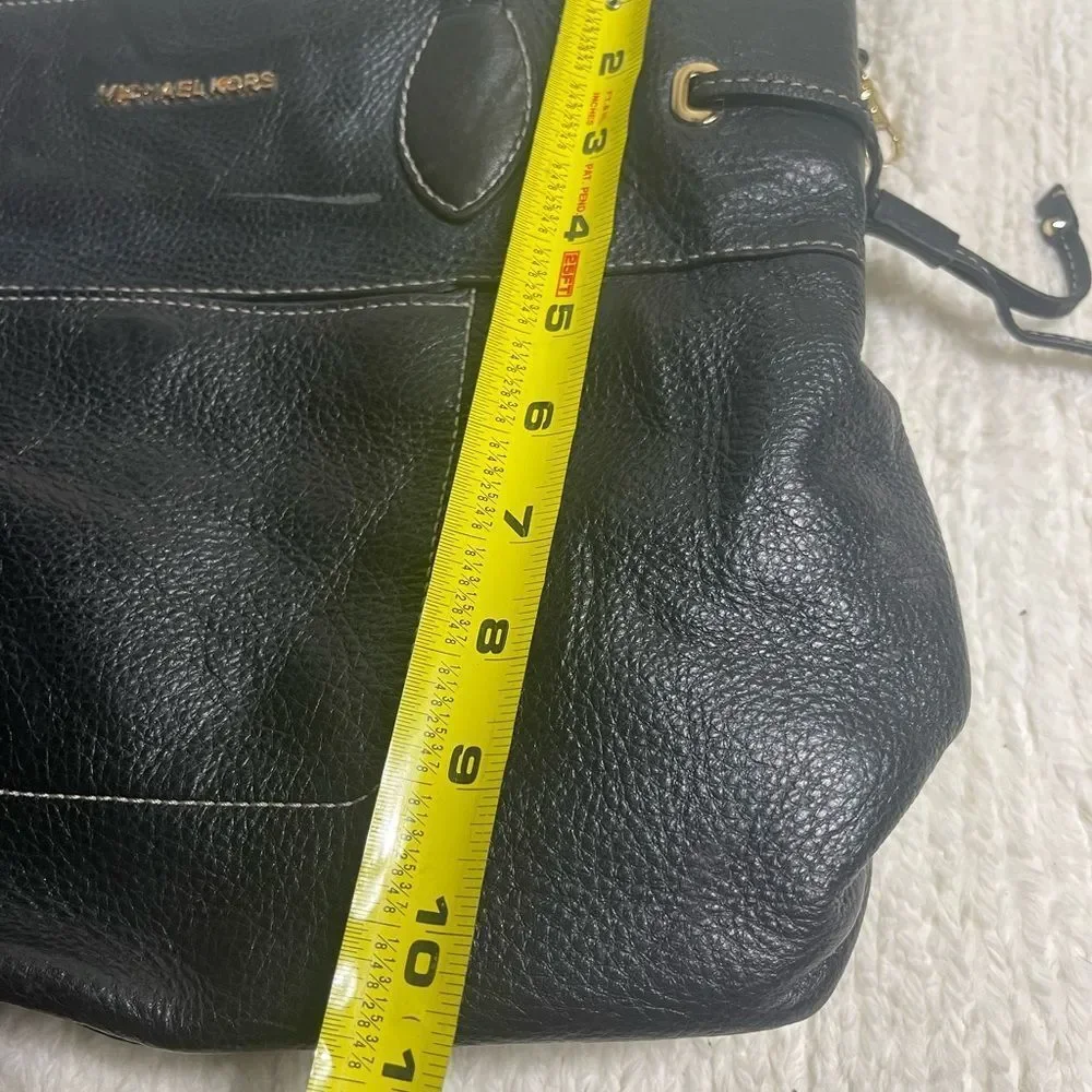 Michael Kors Black Leather Shoulder Bag with side drawstring gold tone hardwares